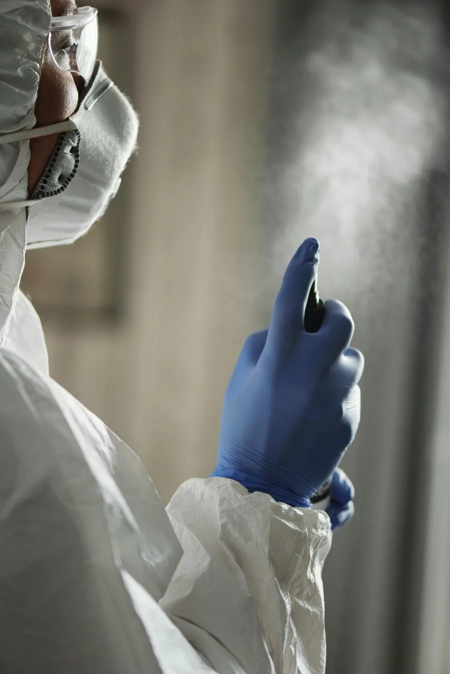 sewage backup cleanup boise — technician in protective gear